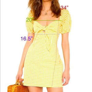 Gorgeous and comfortable yellow gingham front tie dress with puff sleeves